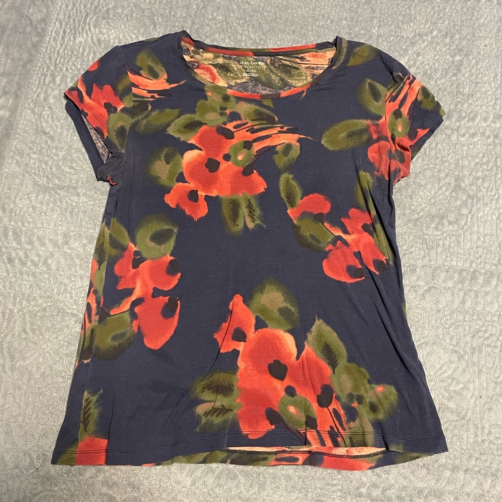 Floral Print T-Shirt on Blue Background.